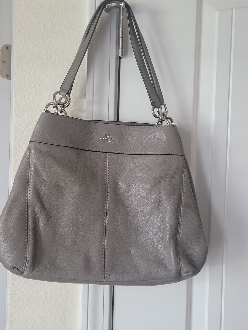 Coach Gray Pebbled leather purse. The first photo Is the Actual Light Gray Color
